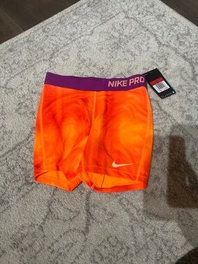 Nike Pro Orange Compression Shorts with Purple Waistband